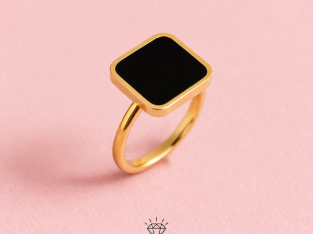 elysian black ring stainless steel anti tarnish gold tone ring with black square top on pink background